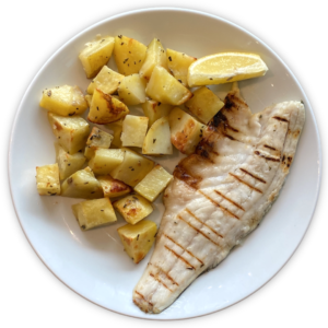 Filetto di Branzino al Forno con Contorno di Verdure